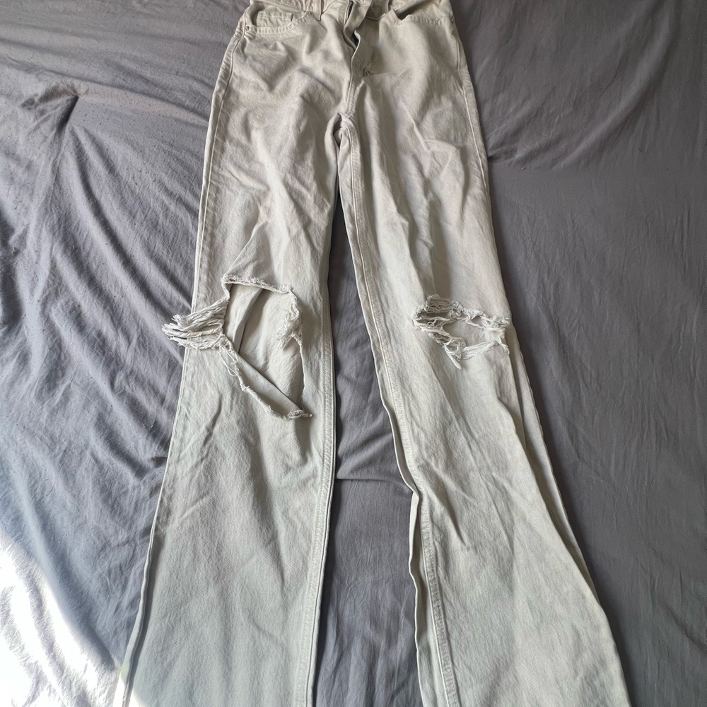 Distressed Cream Jeans